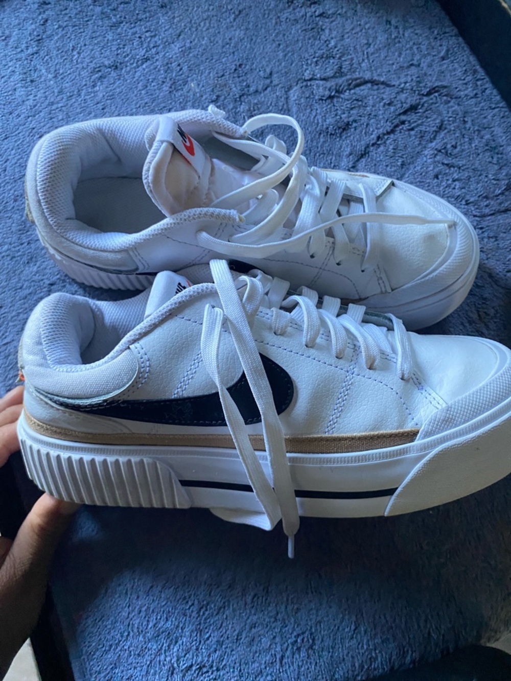 Nike White Low-Top Sneakers with Navy Swoosh and Tan Stripe